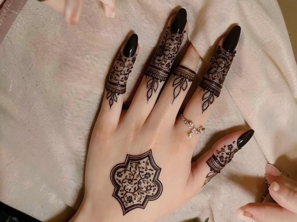 Bridal full hand mehndi design with traditional motifs