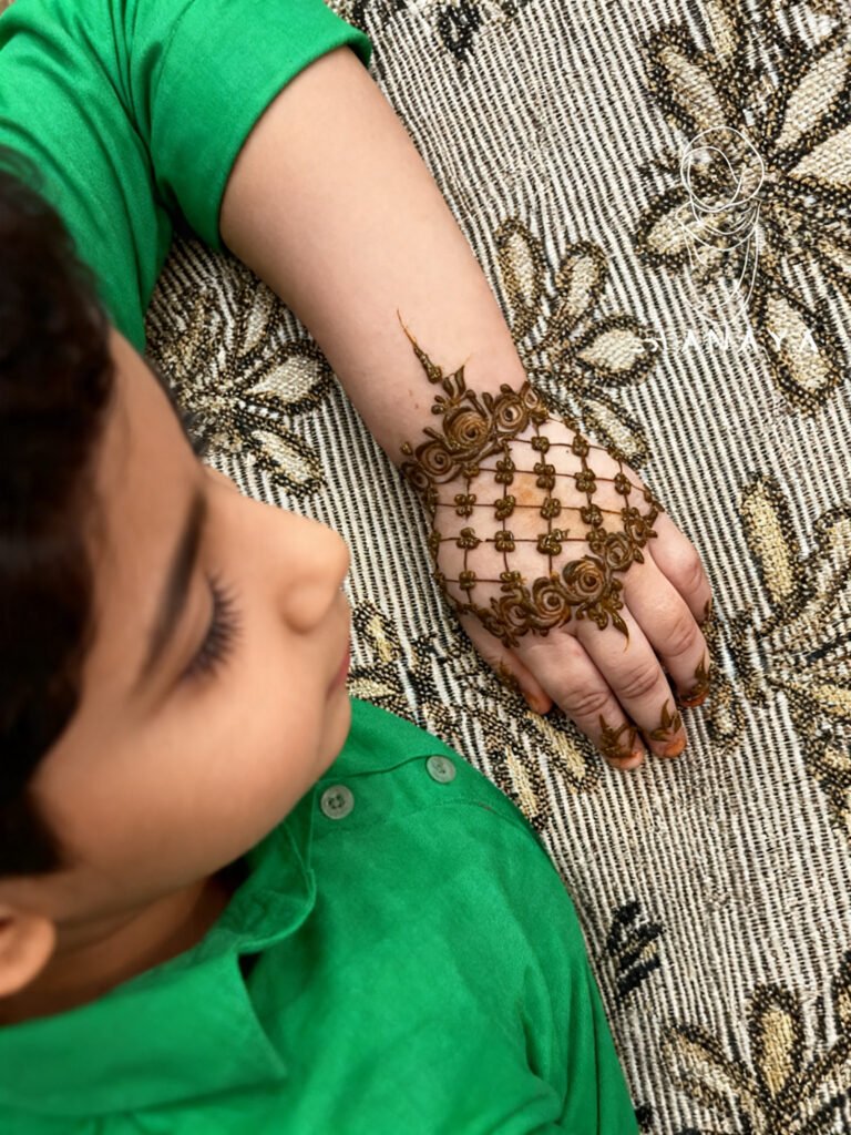 Simple flower glitter Mehndi design for kids
